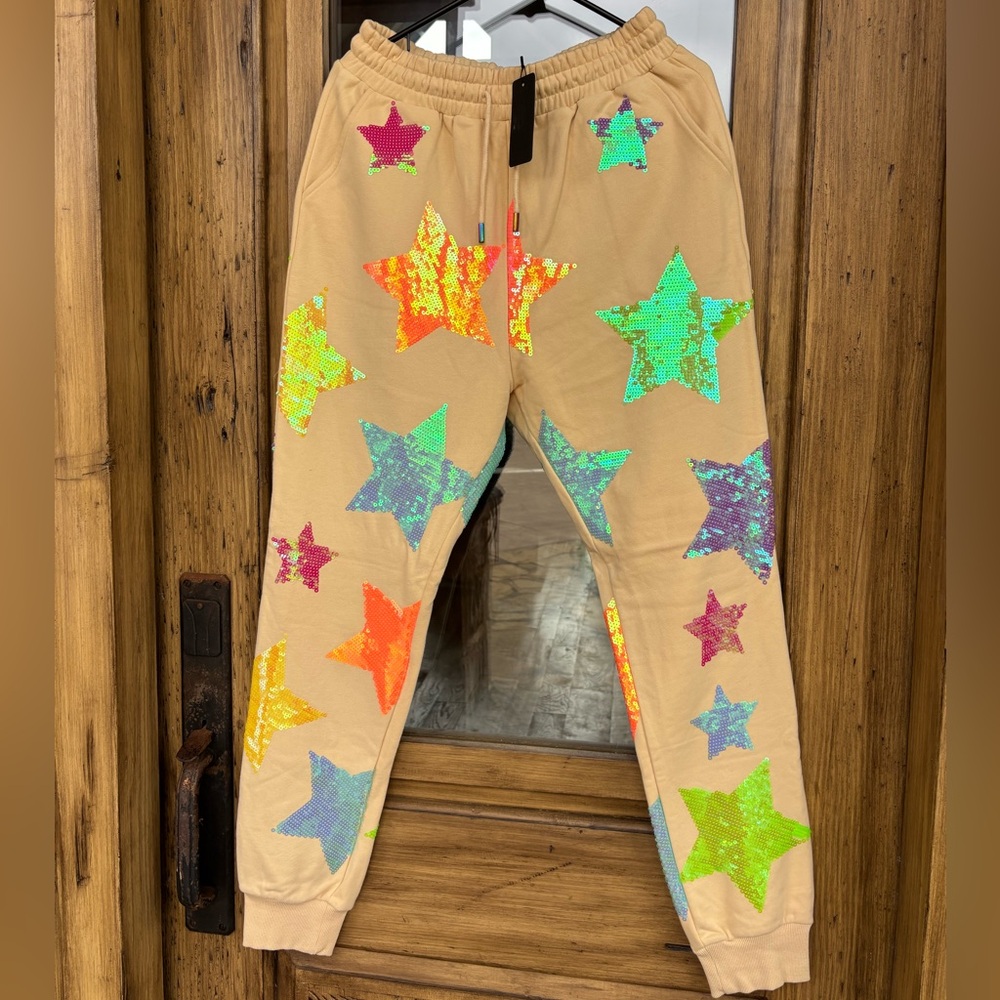 BNWT Queen of Sparkles Mega Star Cream Joggers Size Large